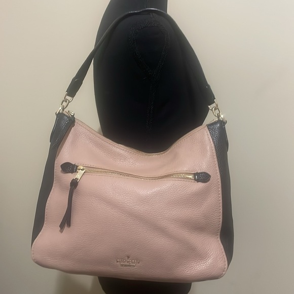 Pre-loved Kate Spade shoulder bag. Colors are fawn and black with gold accents. - Picture 2 of 9